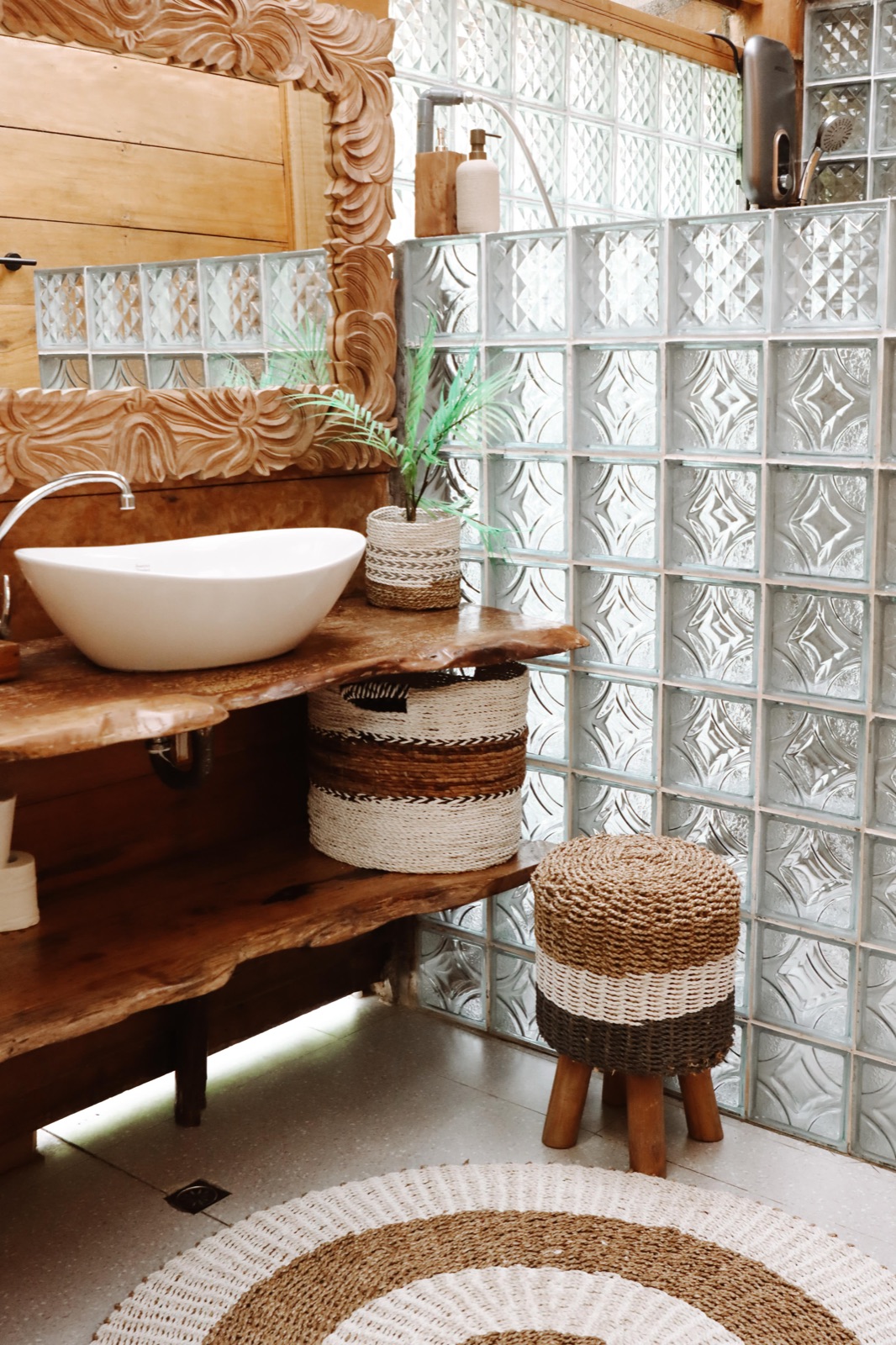 Artisanal wood and rattan bathroom interior at the retreat